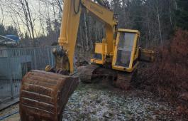 Caterpilar 215 gravemaskin.